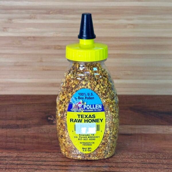 Plastic squeeze bottle of bee pollen granules